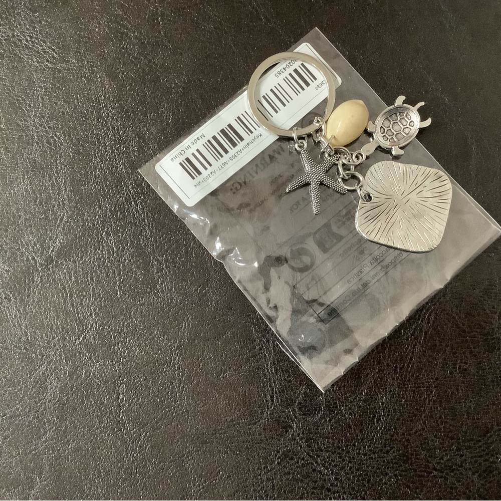 Silver Beachy keychain. Starfish, shell, and turtle charms. NWT. - Picture 1 of 4